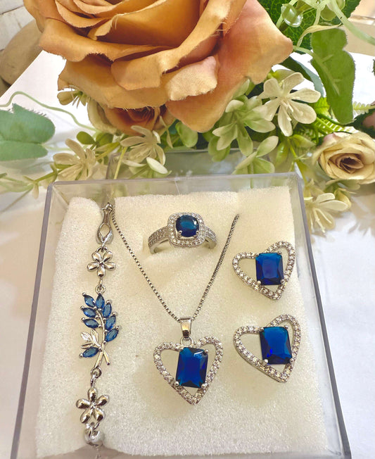 Silver-toned jewellery set featuring black stones