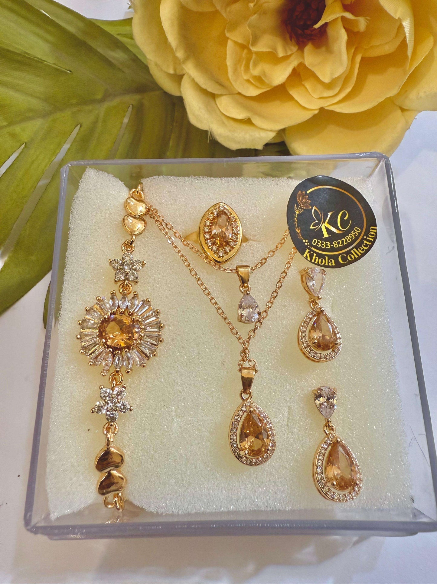 Silver-toned jewellery set featuring black stones